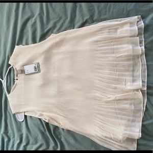 Peplum sleeveless blouse NWT